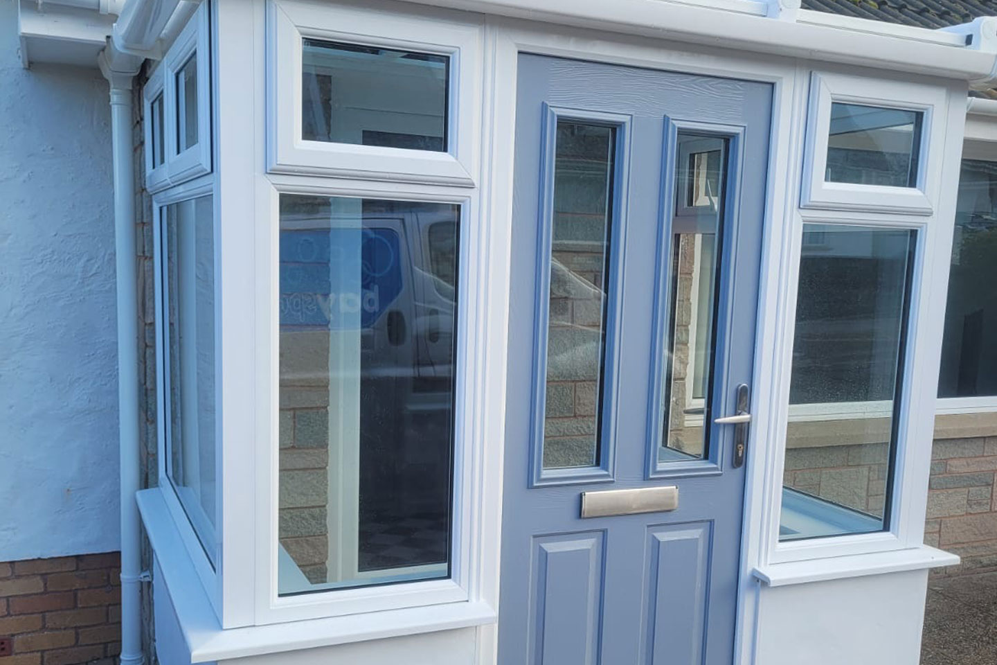 Light blue coloured doorstop composite door