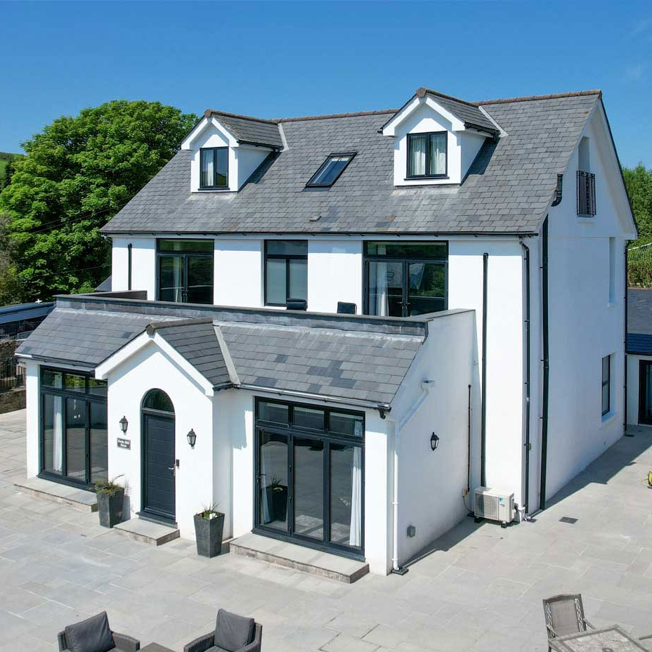 House with grey coloured doors & windows