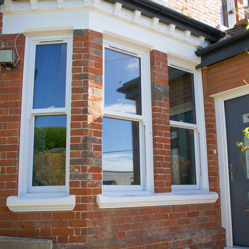White coloured bay window fitted to a home