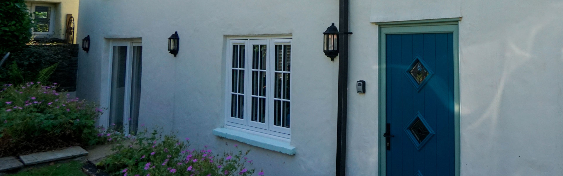 Residence 7 Flush casement windows and a Solidoor composite front door fitted by the Woodstock Windows team