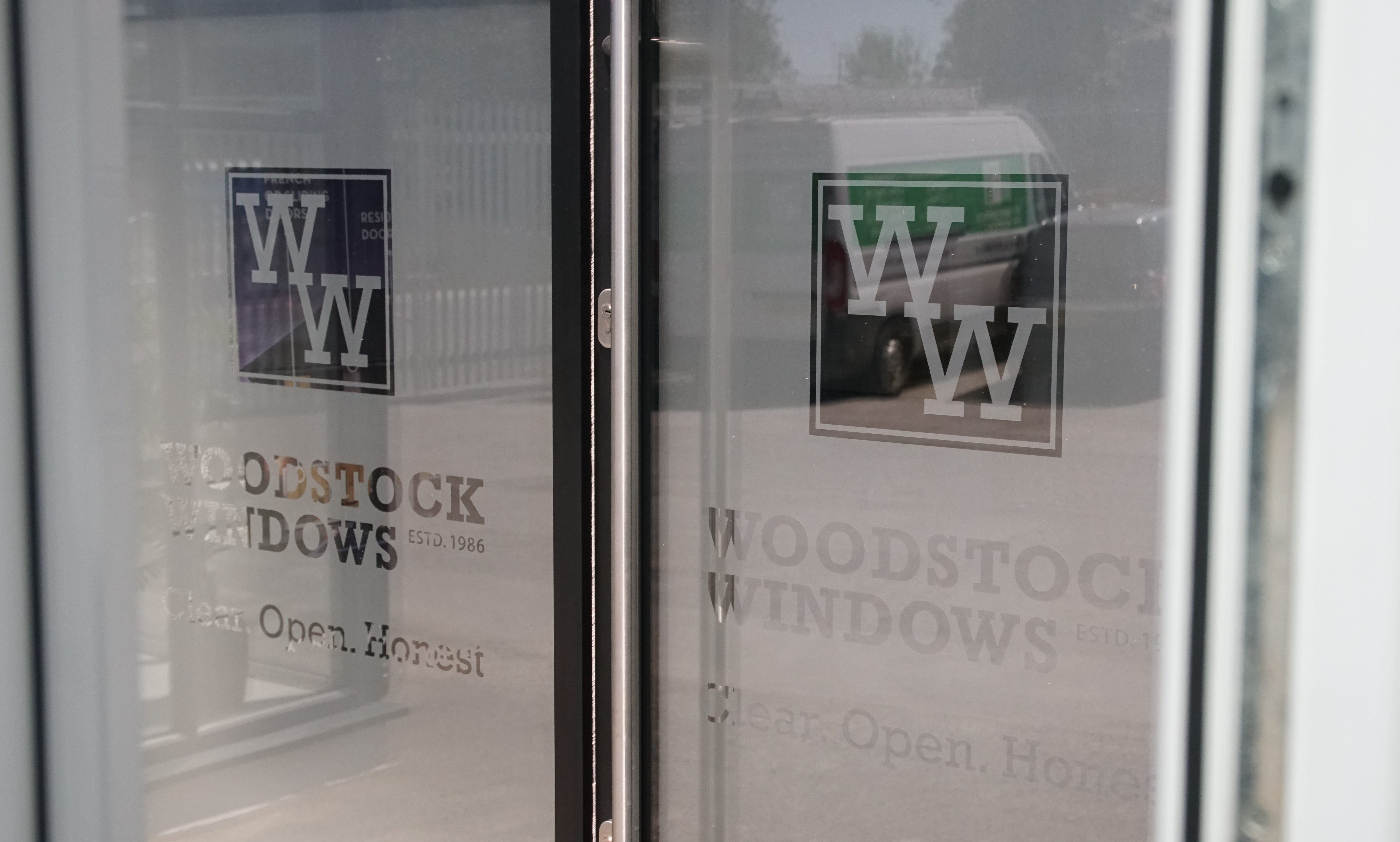 Welcome to our showroom frosted front door
