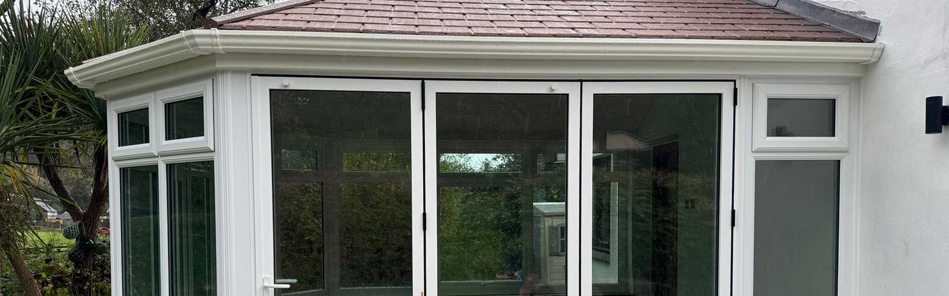 Durabase Conservatory with a tiled roof fitted by Woodstock Windows
