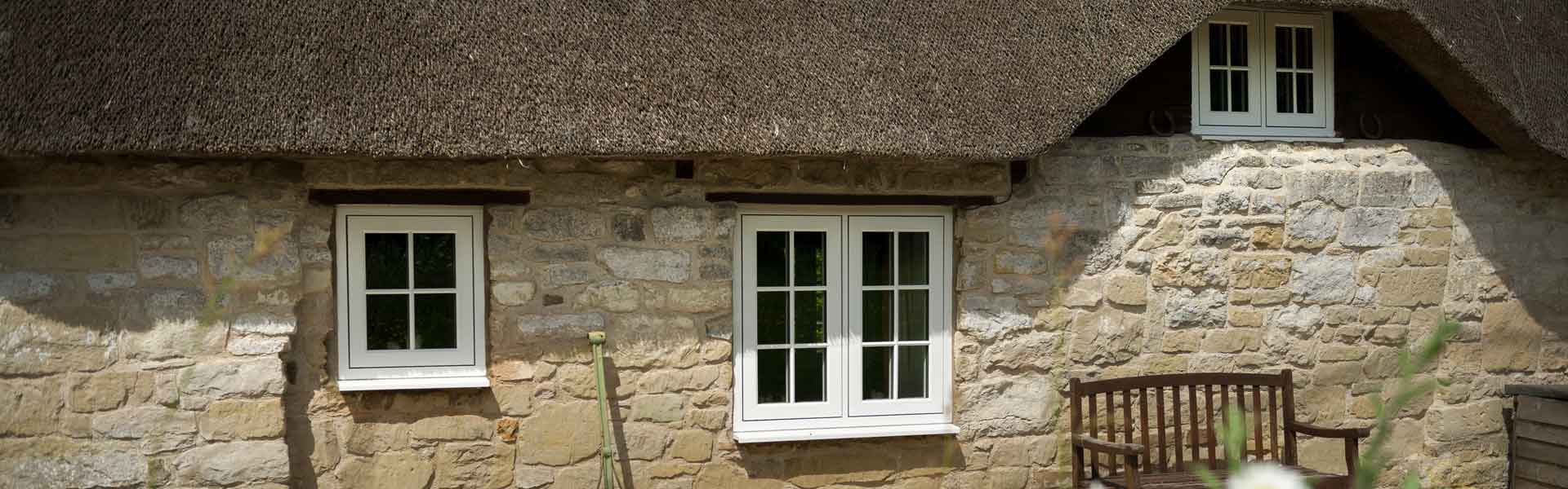 Traditional stone built home with fitted Residence collection 9 windows