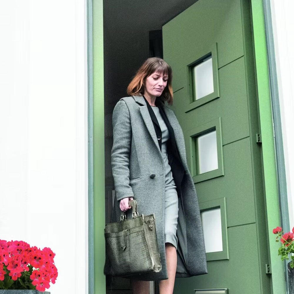 Green coloured square payned front door