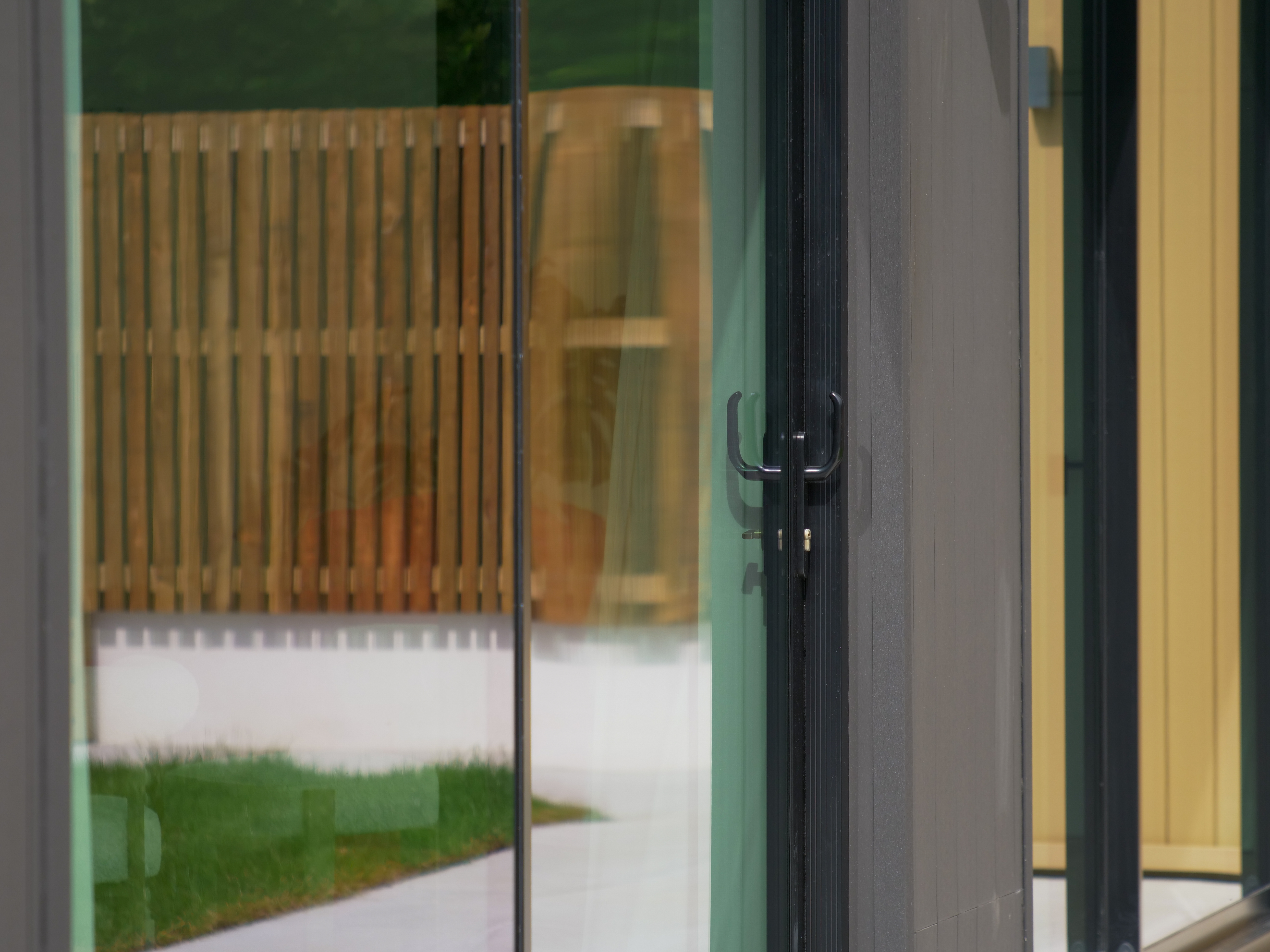 Close up of bi-fold door and handle