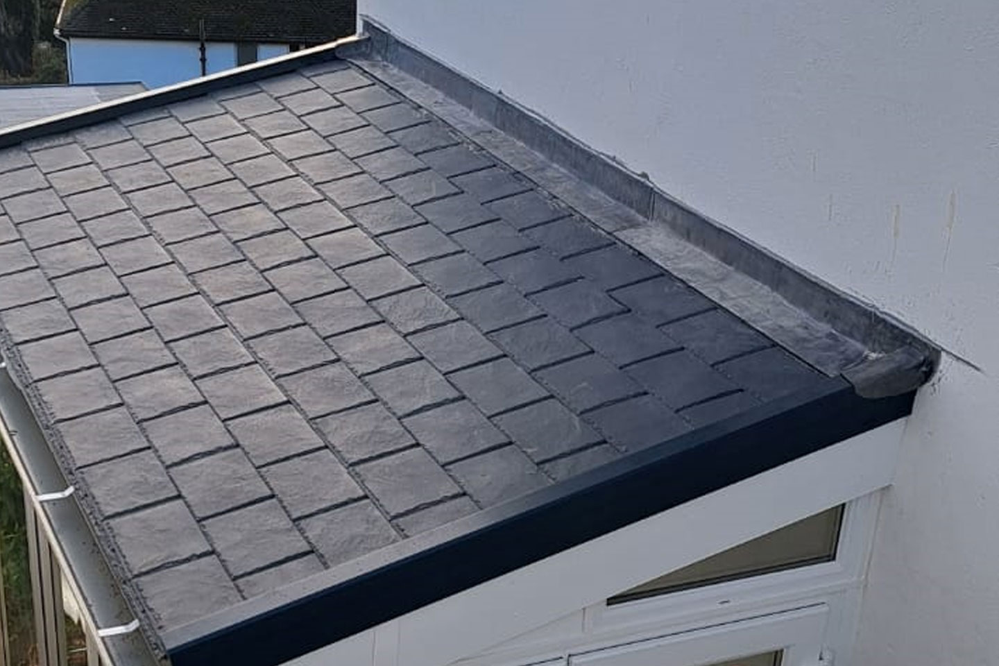 Grey tiled Warm roof for a conservatory