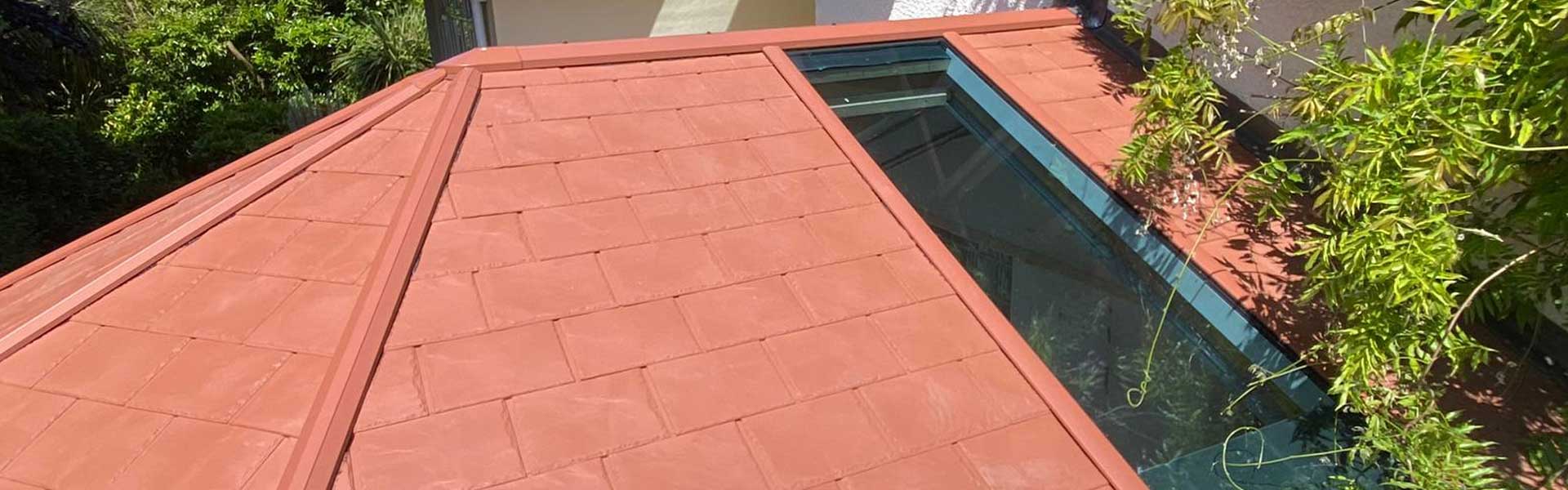 Red coloured warm roof tiled conservatory