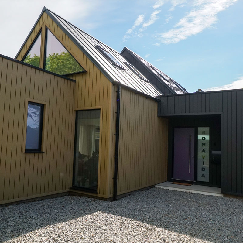 Smarts black aluminium windows fitted to a cladded home