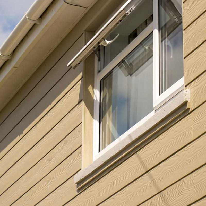 Cladding and gutters fitted to a family home in Braunton