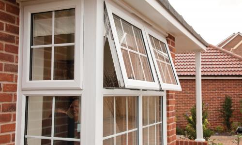 White over hanging upvc windows