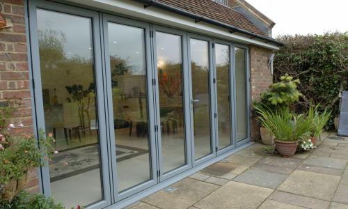 Bi fold wide fascia doors in aluminium