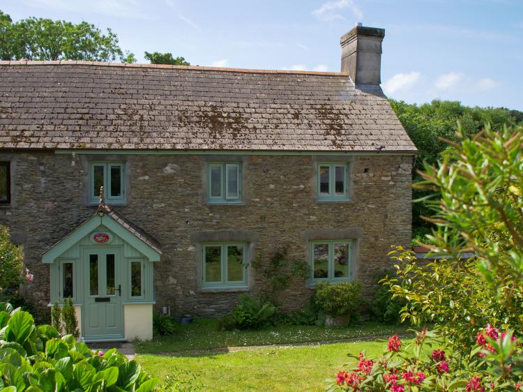 House with green coloured windows and door