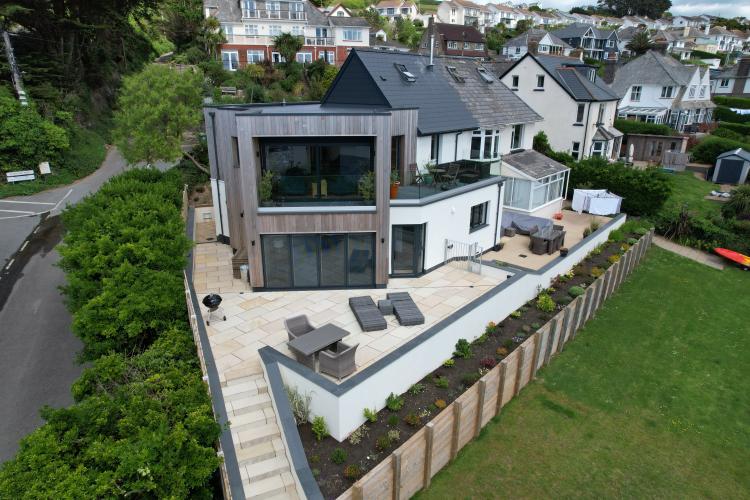 Greay coloured windows and sliding doors on a North Devon home