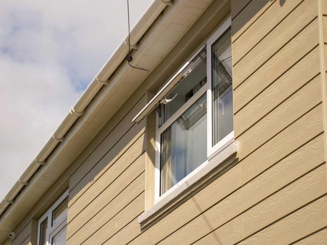 Upper uPVC windows and cladding