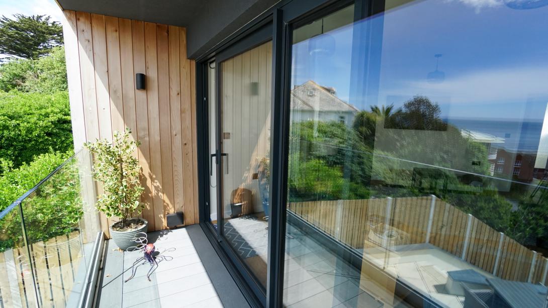 Grey coloured sliding patio doors