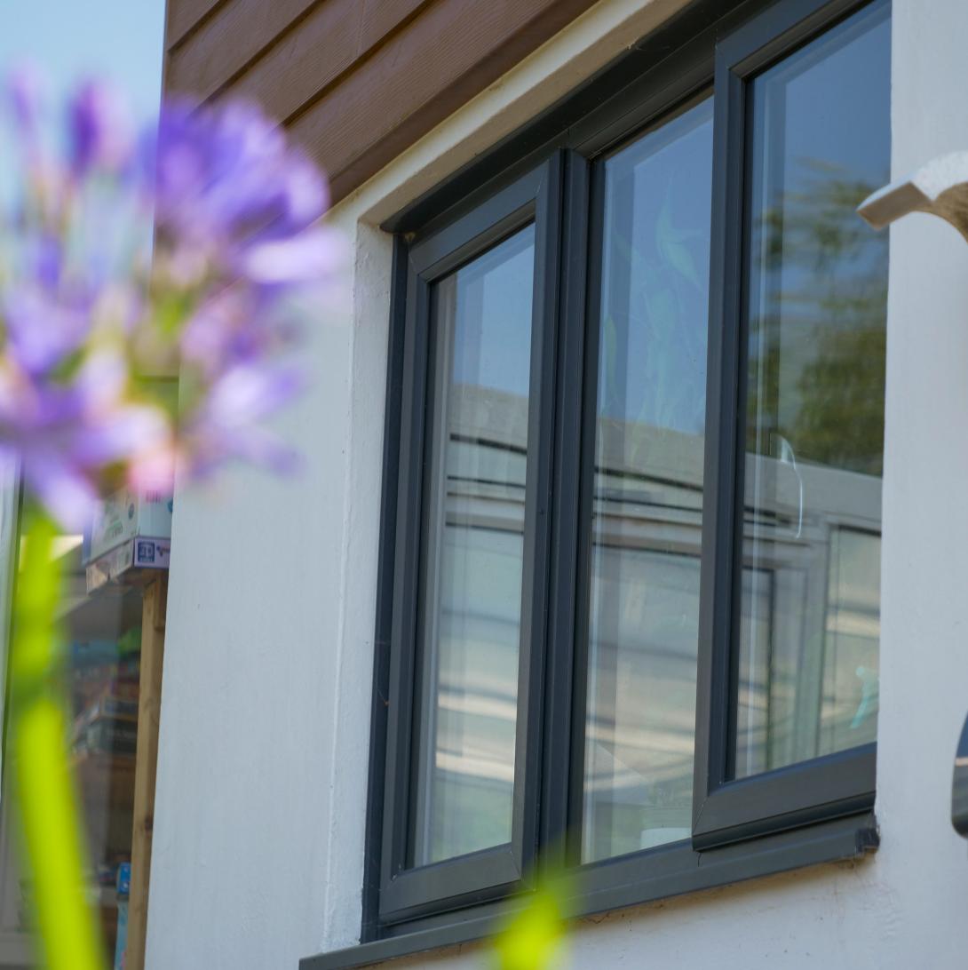Grey coloured window fitted to a home