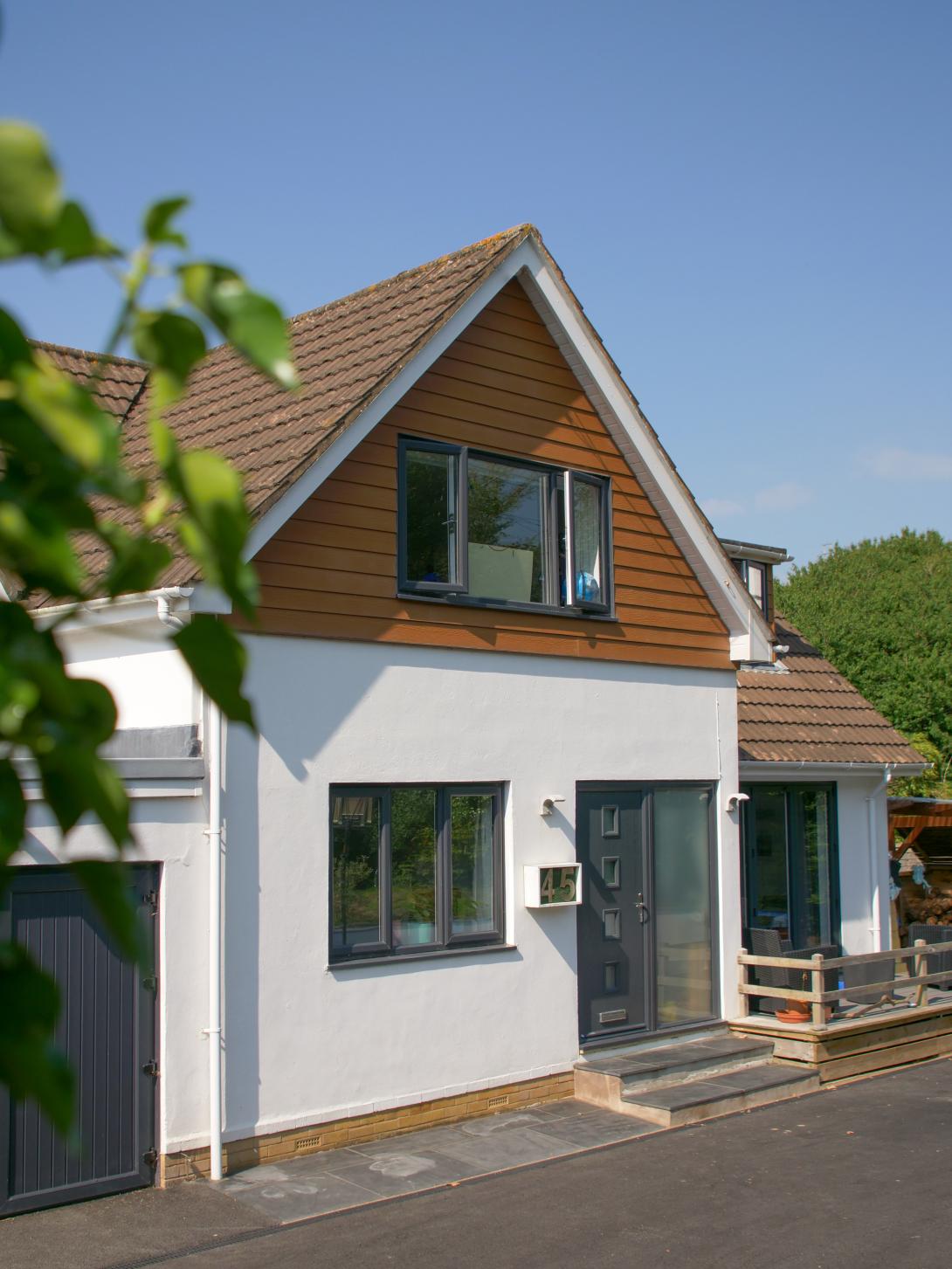 Front view of a home with fitted windows and doors by Woodstock Windows