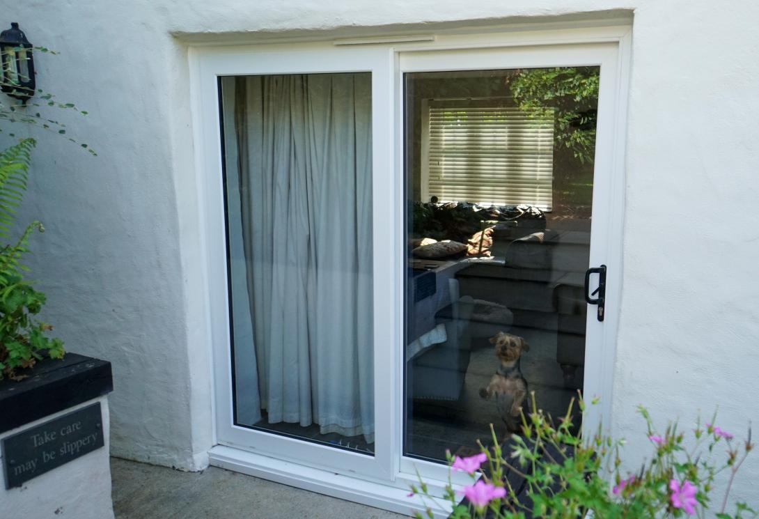 uPVC sliding patio door in a white grain finish