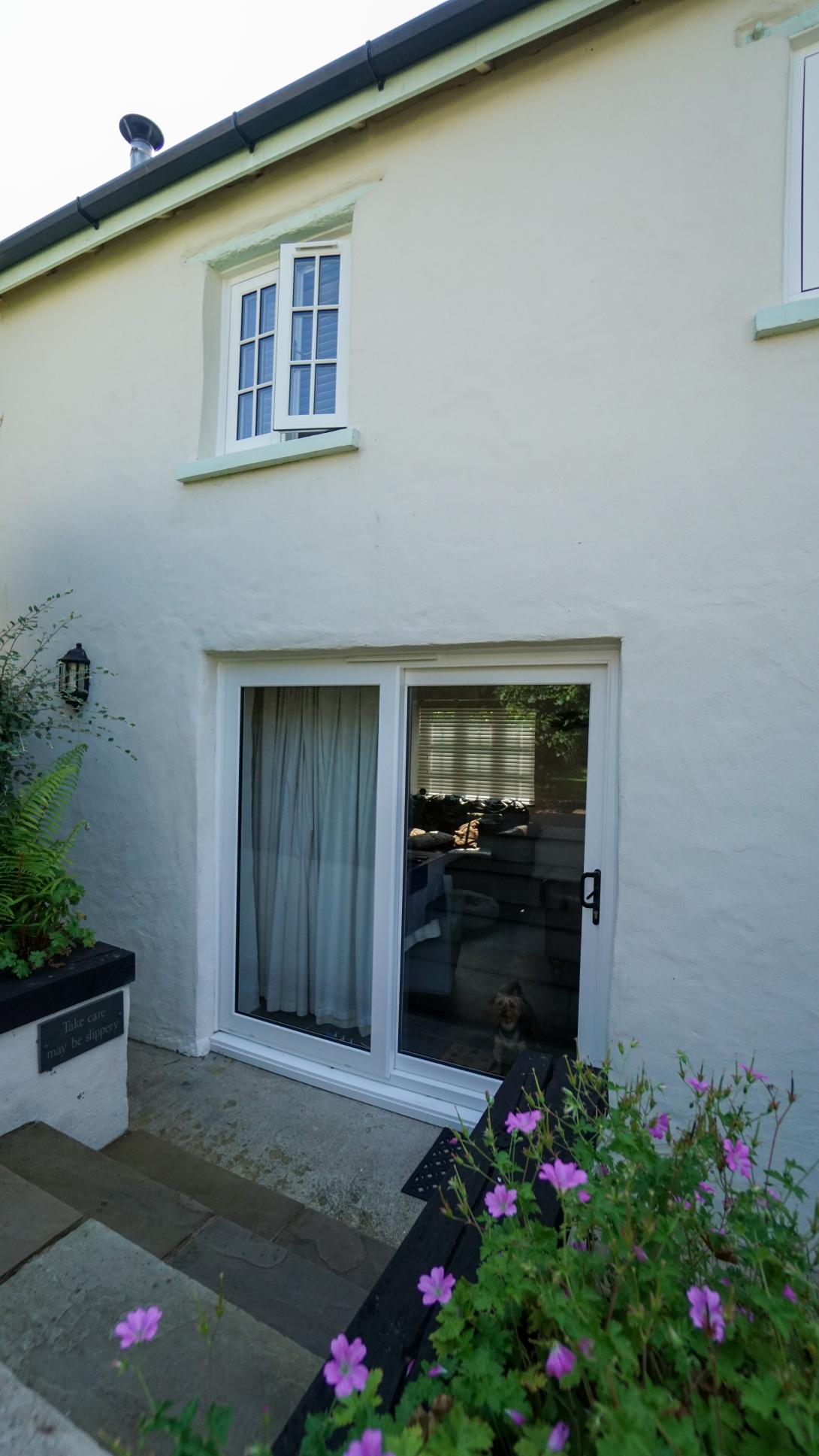 Residence 7 flush casement windows and a uPVC sliding patio door