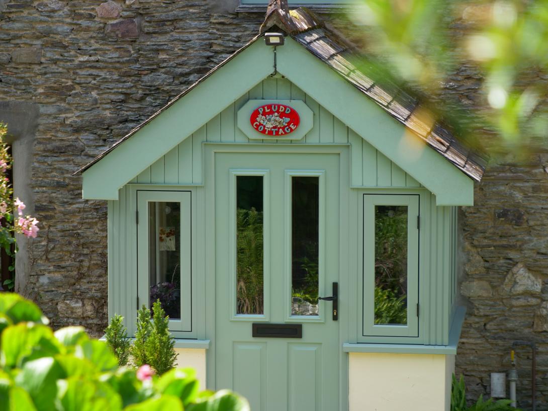 The Porch at Pludd Cottage featuring products from the Residence 9 collection