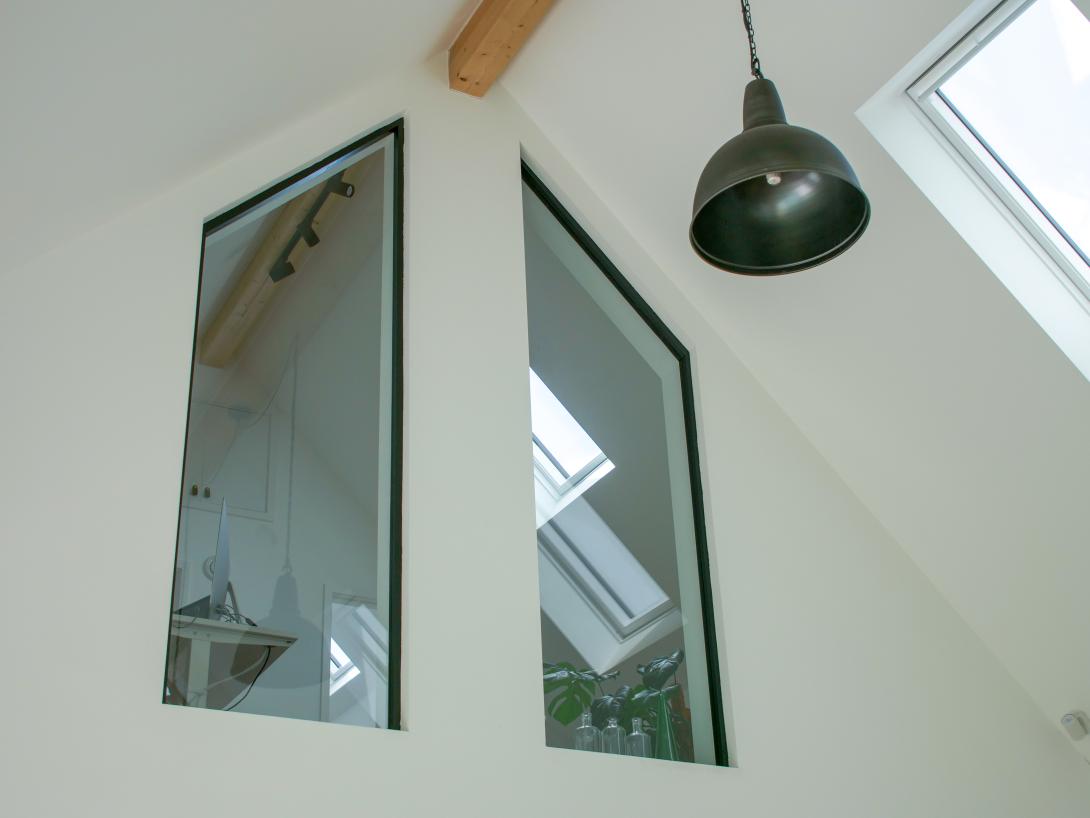 Inside view of indoor triangular shaped panel windows