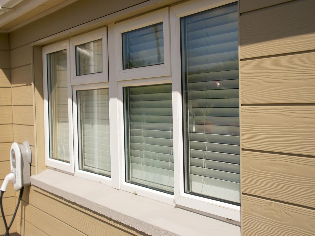 White coloured A-Rated uPVC Window and cladding