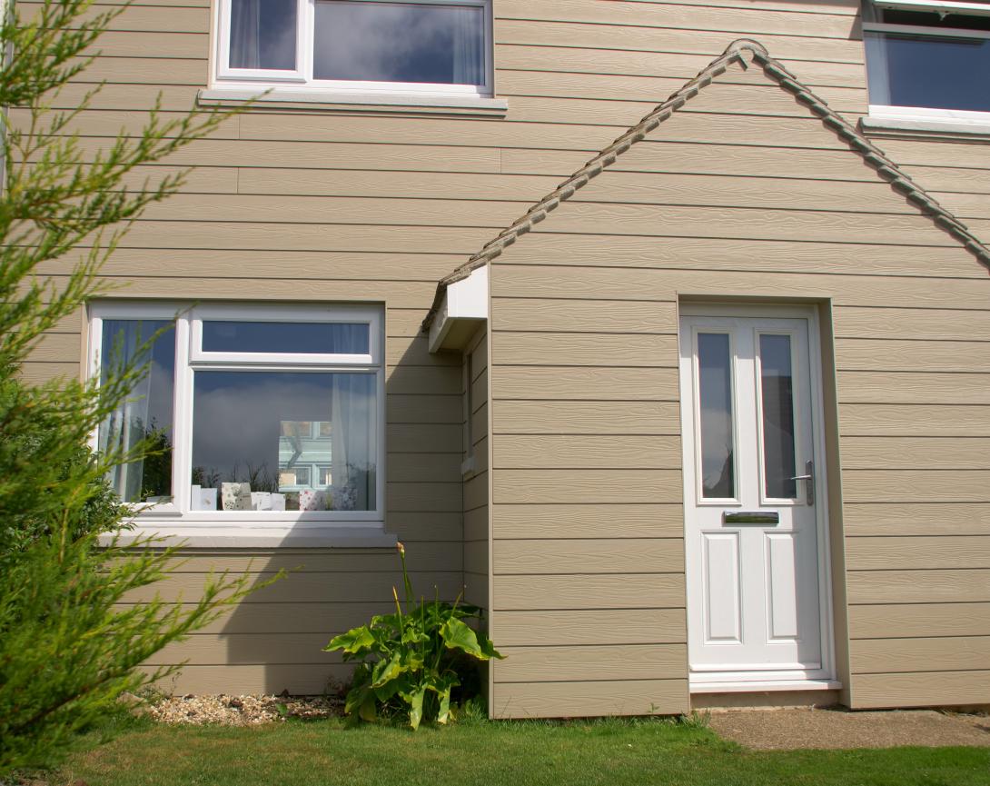 A-Rated uPVC Windows, cedral cladding and a Solidor composite front door